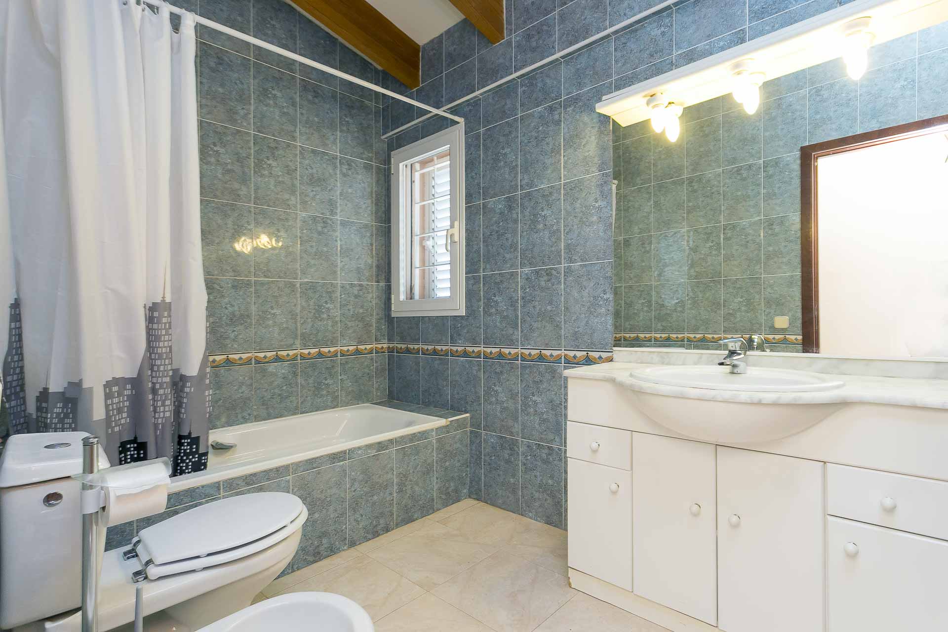 Large bathroom with bath and shower house rental